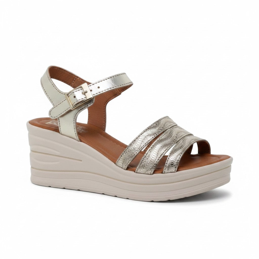 Sandales compensées dorées en cuir